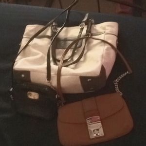 1 coach purse and 2 Michael kors...